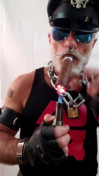 Leather Dad Lighting a Big Ring