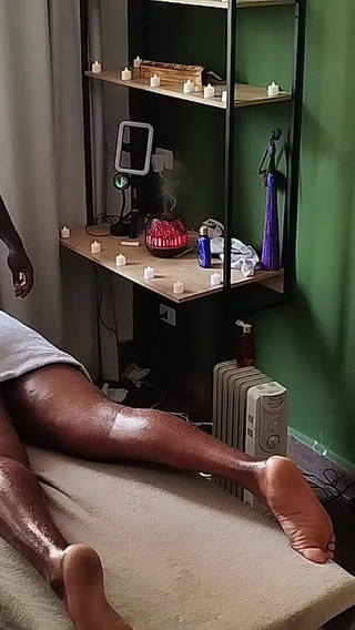 Camera Captures Image of Bear Receiving Massage.