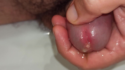 Close up Pissing and Playing with Peehole