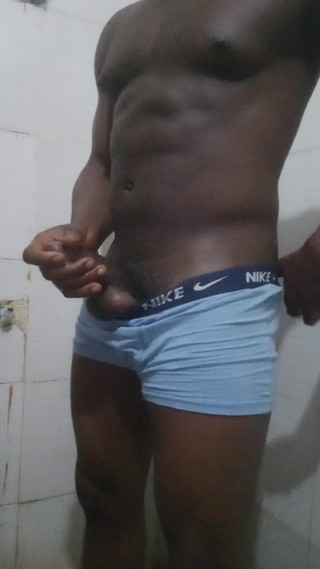 Muscled Black Nigerian Guy Jerks off in the Bathroom.