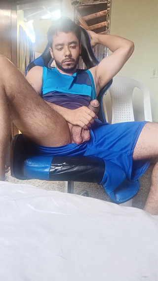 Latino Boy Playing with His Cock