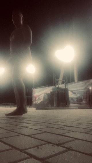 Eats Cigarette Butts and Trash From a Trash Can on the Street