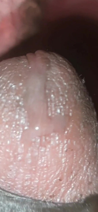 A Man Is Masturburating in His Bedroom.