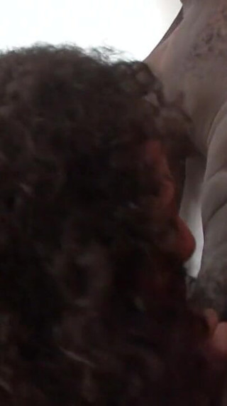 Big black friend helps his friend relax