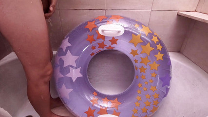 Bathroom with inflatable swim ring