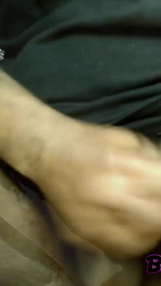 College jock stretches out gluts before basketball practice