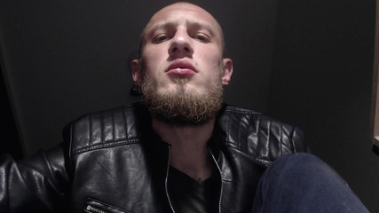 Hot Master in Leather Jacket and Boots.