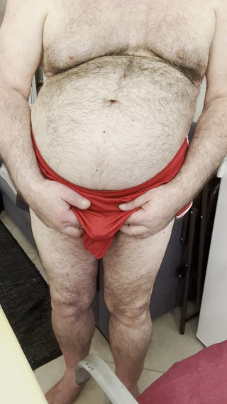 Coach Karl's Balls Accidentally Slip Out of His Gym Shorts, While Stroking His Cock.