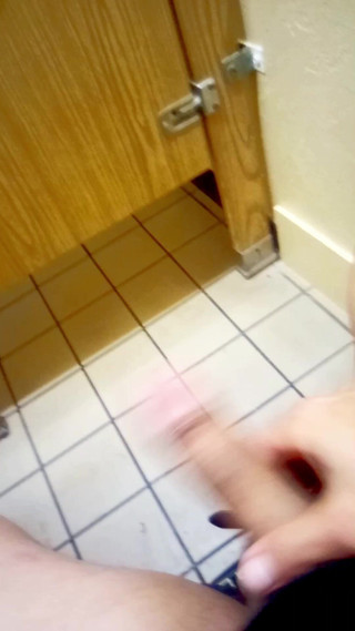 Handsome Young Hunk in Public Restroom Strokes Cock Until He Explodes All Over Himself and the Wall