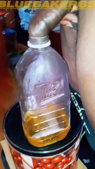 Pissing in a Large Juice Container