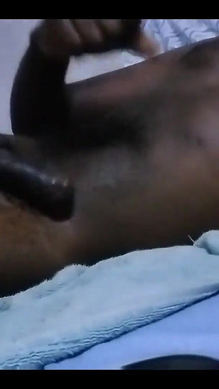 Horny Black Male Huge Cumshot While Watching Porn