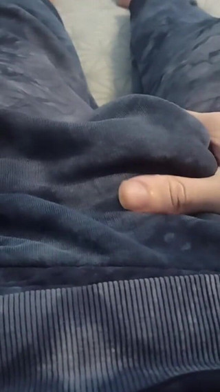 Guy in Pants Is Massaging His Cock