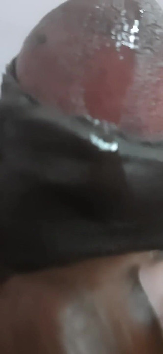 A Man Is Savoring a Moment of Intimacy with Himself.