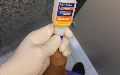 In a Doctor's Office I Apply Hot Glue to My Dick
