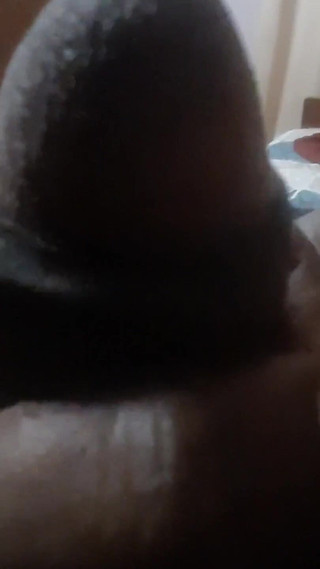 A Guy Is Finding Pleasure in the Quiet of His Bedroom.